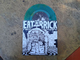 Eat A Brick 7" Demo on translucent green vinyl with white cover